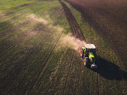 Tractor plawing a fiend